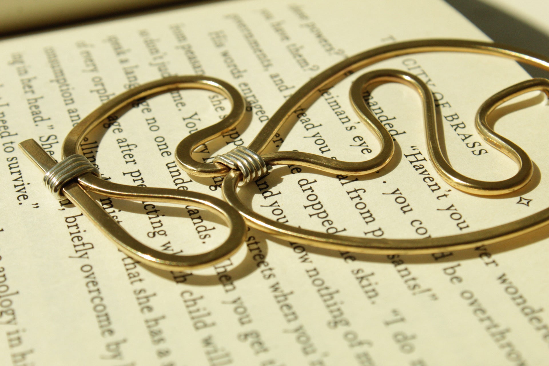 Held between Pages.